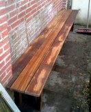 10 Wadituin De bank verhult de regenpijp